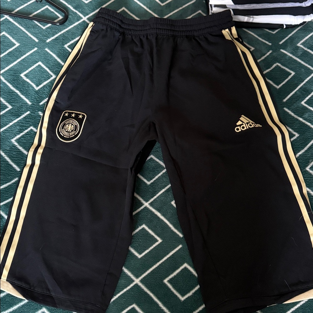 Adidas Black Shorts with Gold Stripes